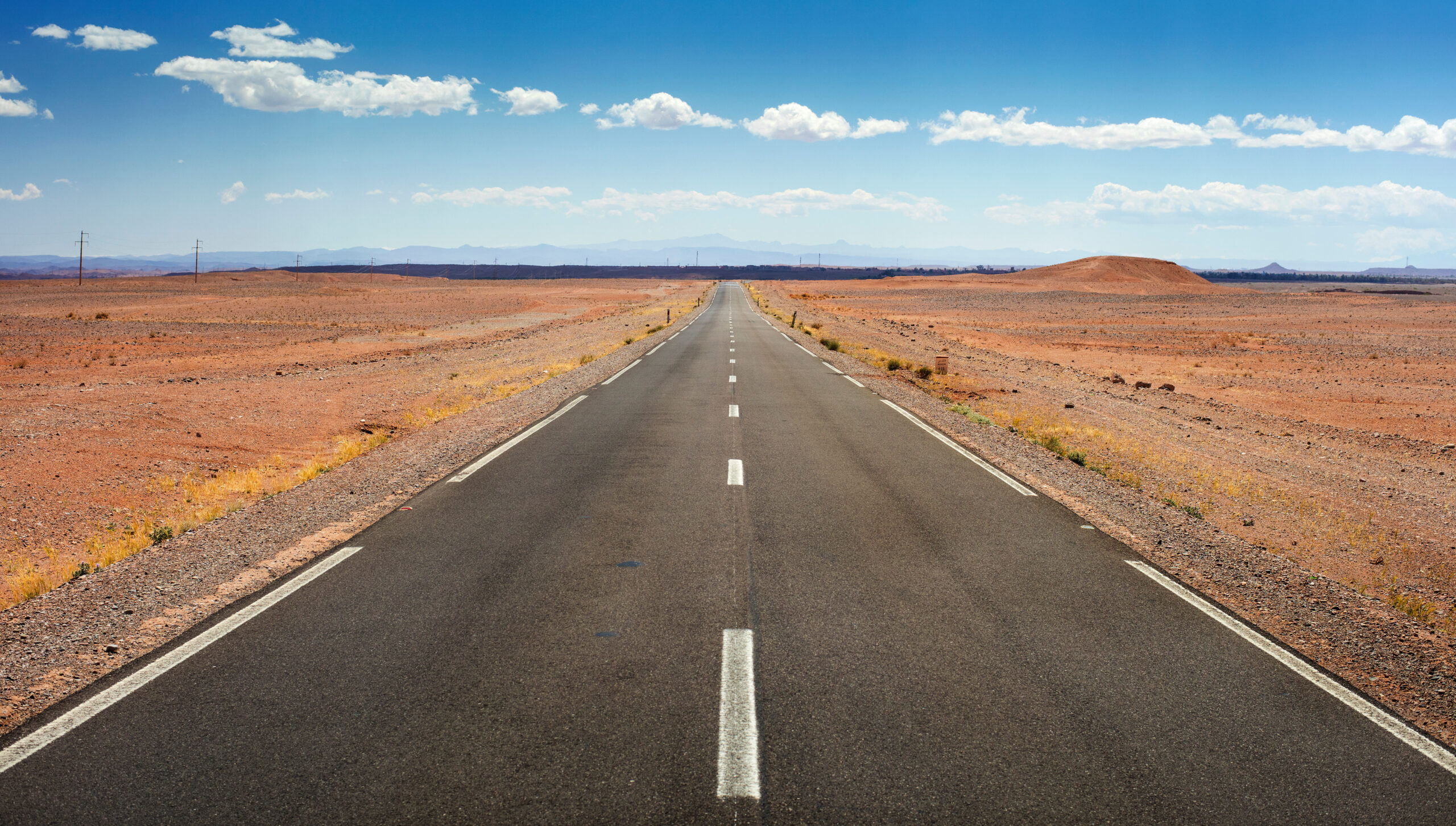 production-services-and-filming-in-marocco-empty-asphalt-desert-road